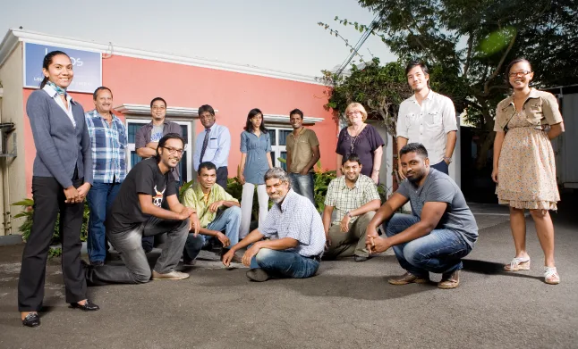 Team under the Logos sign, around 2012, Logos, Team through the years, Logos Publicity Ltd, Mauritius